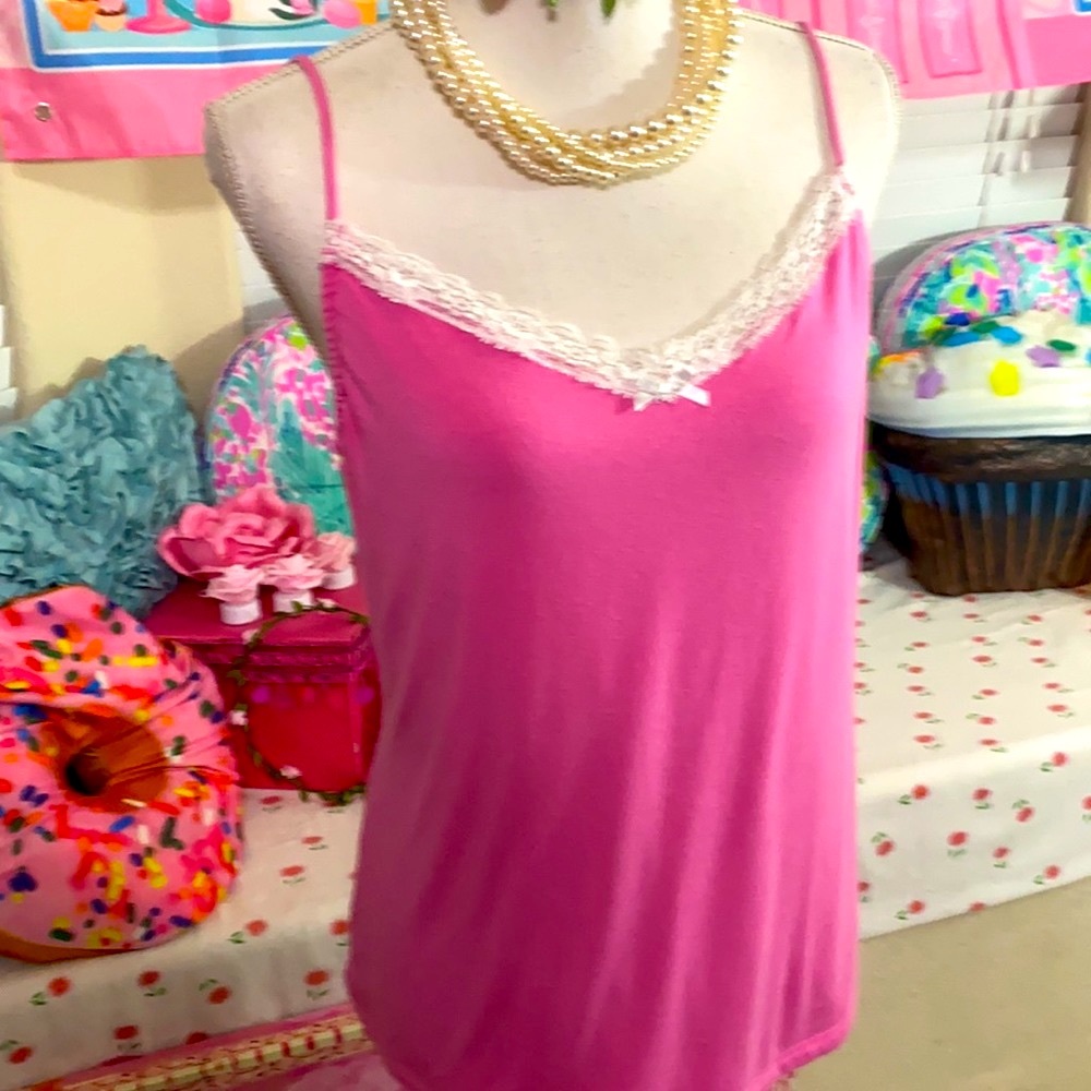 Caesars pink camisole with white lace décolleté
